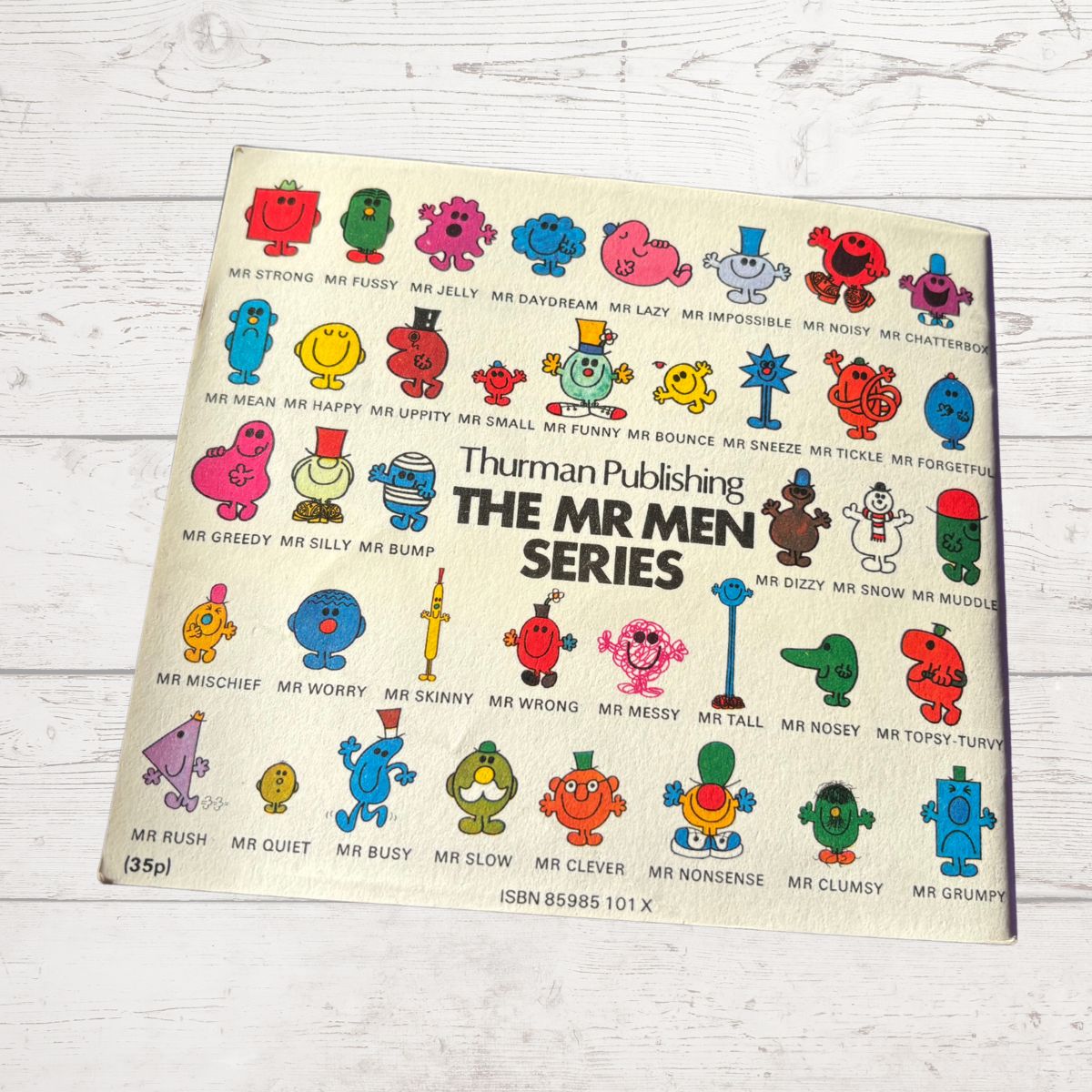 Vintage book cover of 'The Mr Men Series' by Thurman Publishing with colorful characters on a light background.