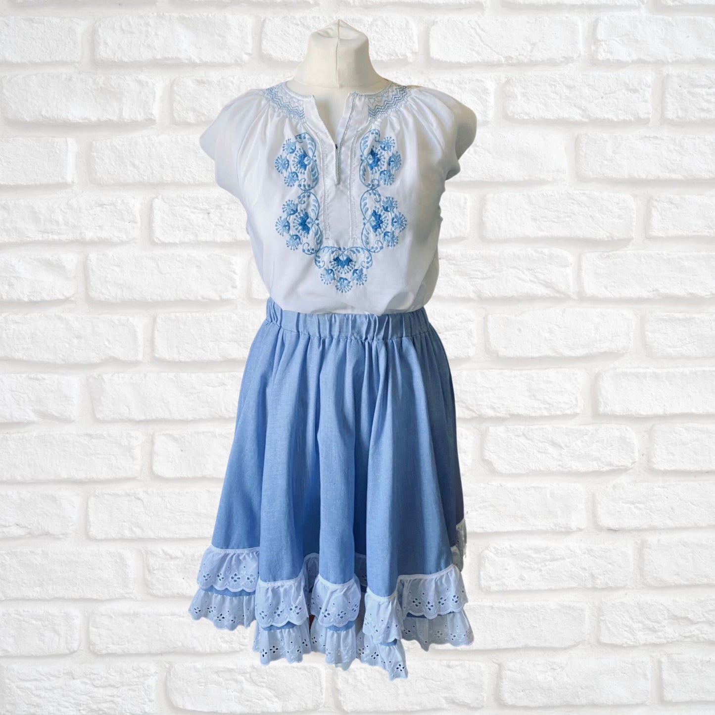 80s sky blue vintage mini skirt with white double ruffle hem. Approx UK size 6-10