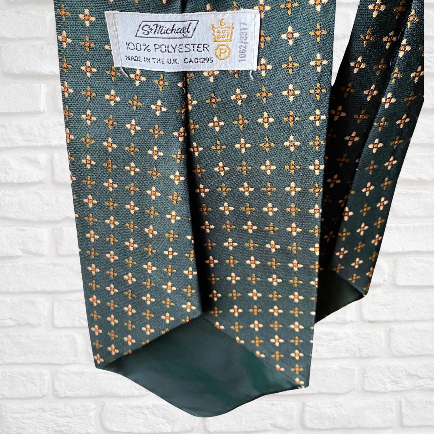 70s Wide Green Vintage Tie with orange, cream and green abstract floral design.