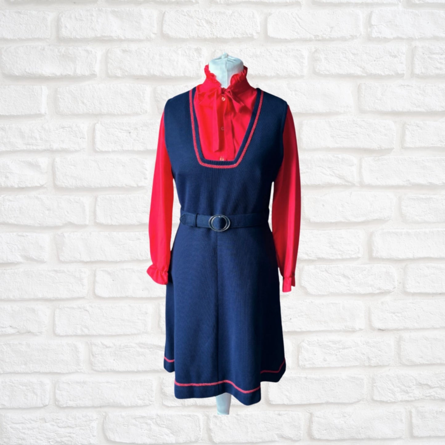 60s navy blue pinafore dress with red brocade trim and matching belt. Approx UK size 12-14