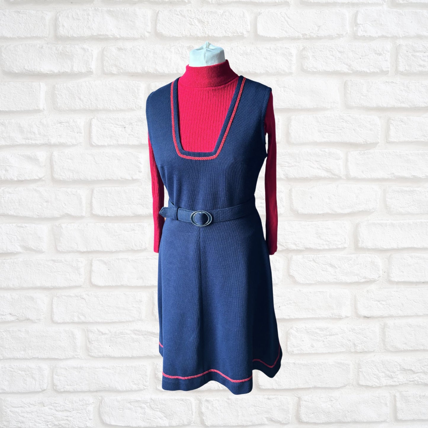 60s navy blue pinafore dress with red brocade trim and matching belt. Approx UK size 12-14