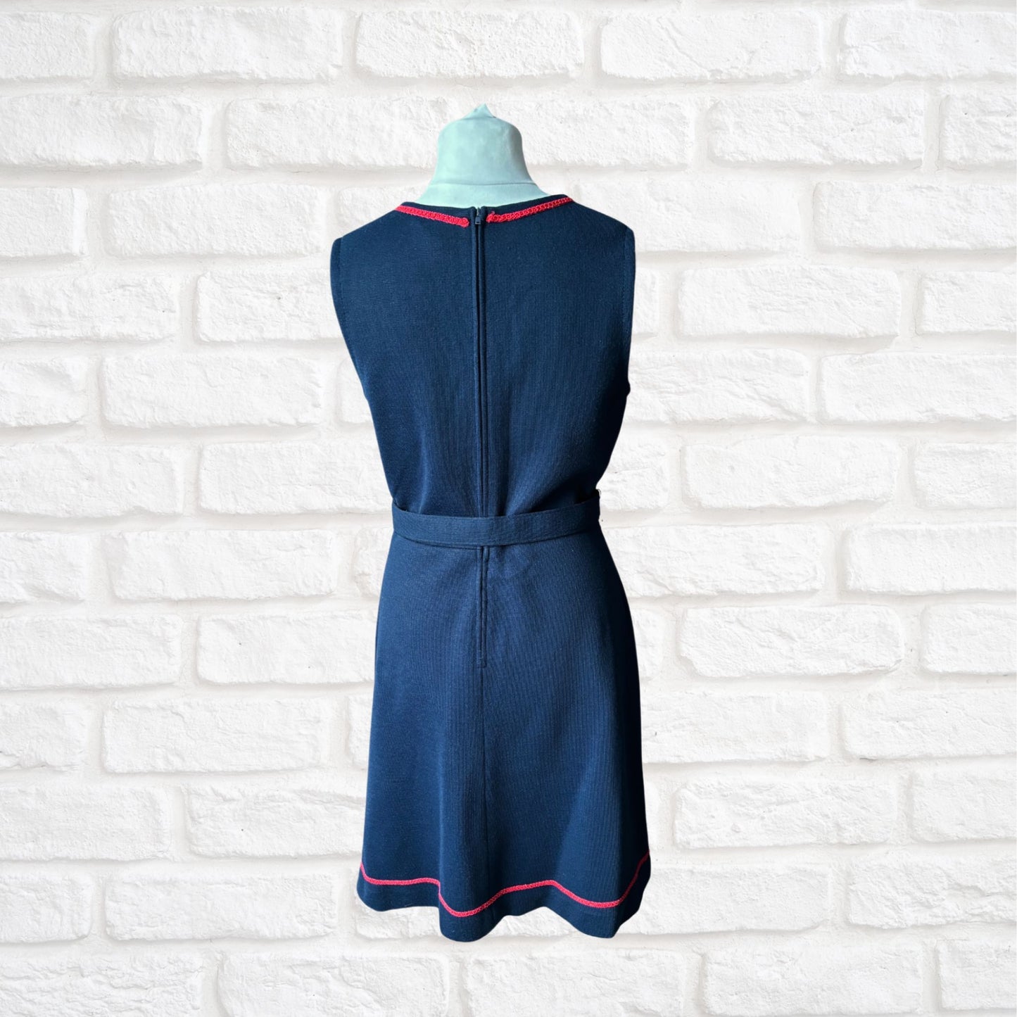 60s navy blue pinafore dress with red brocade trim and matching belt. Approx UK size 12-14