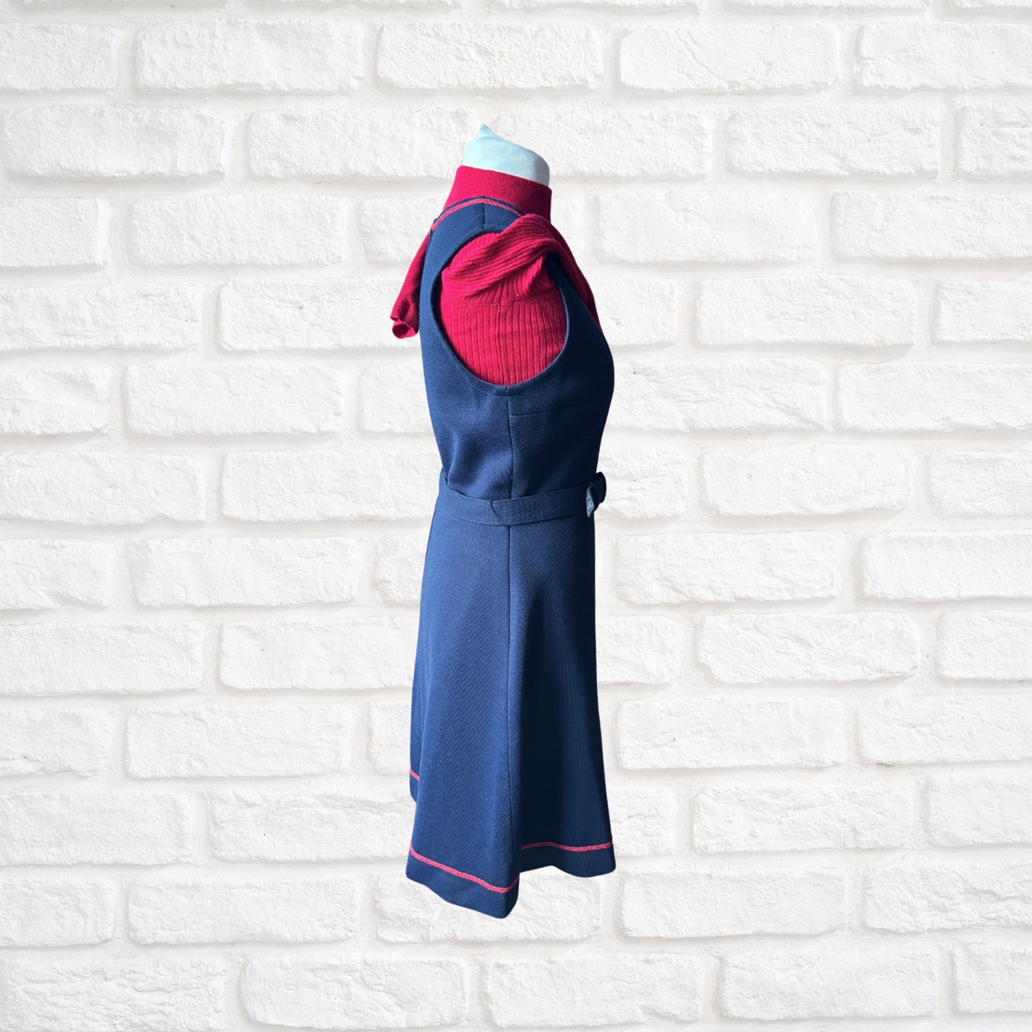 60s navy blue pinafore dress with red brocade trim and matching belt. Approx UK size 12-14