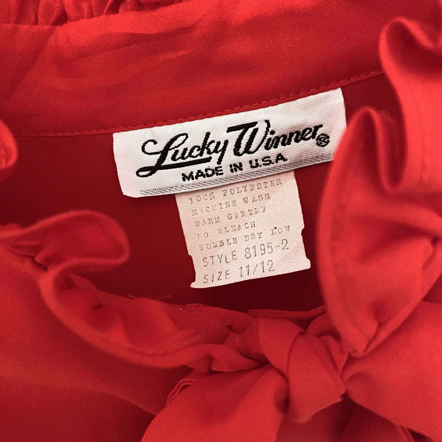 Red 80s secretary blouse with high frill collar and tie neck. Approx UK size 10-12