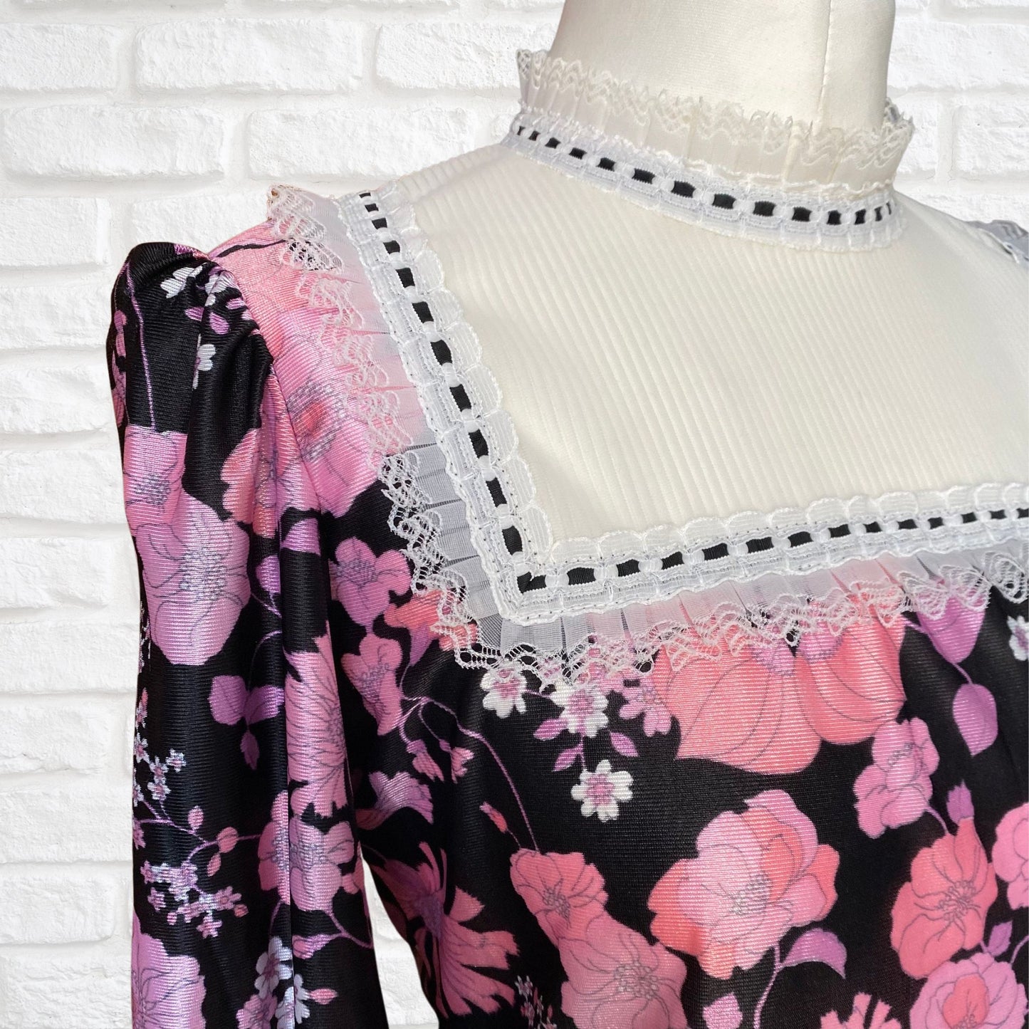 60s high necked long sleeved black and pink floral blouse  . Approx UK size 10-12