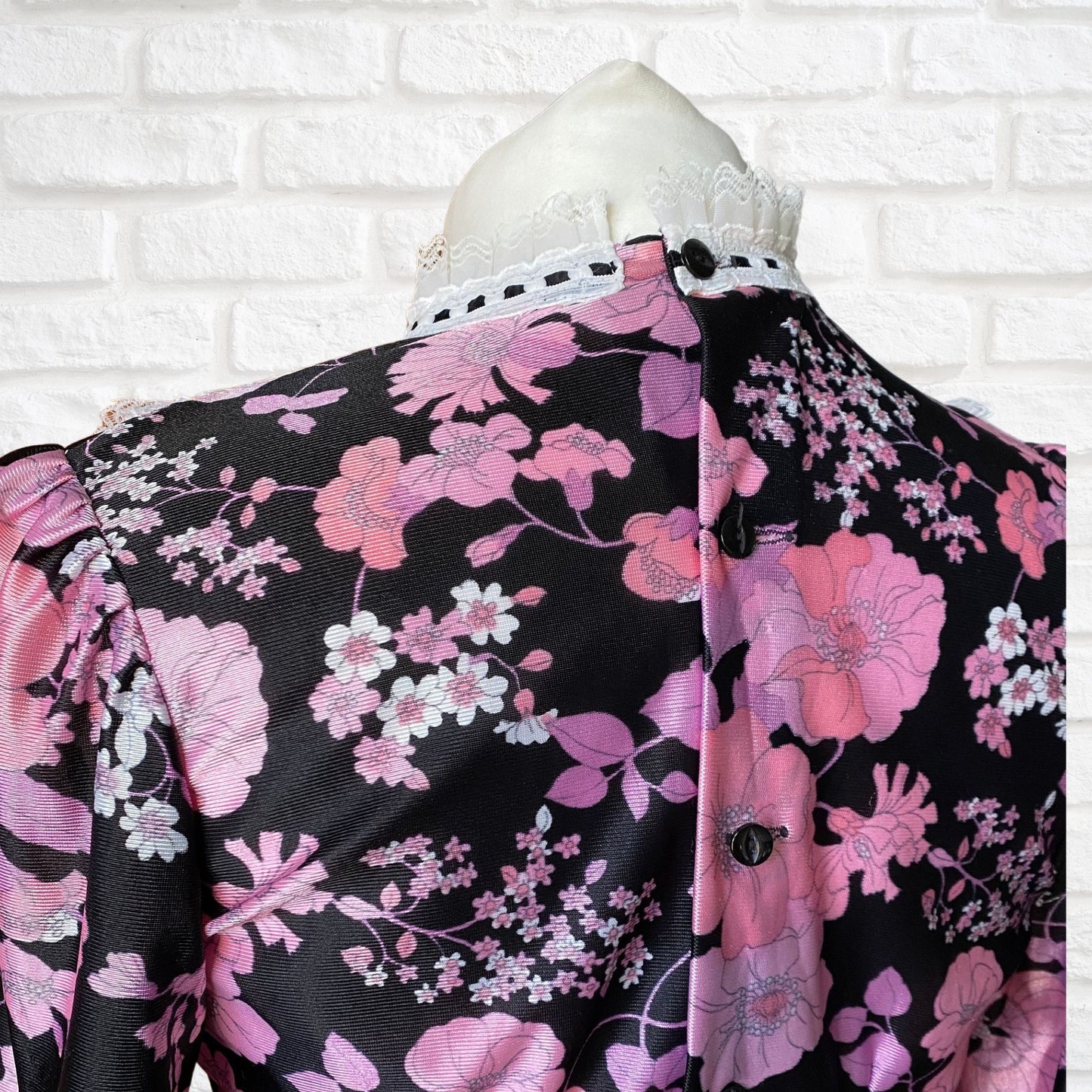 60s high necked long sleeved black and pink floral blouse  . Approx UK size 10-12