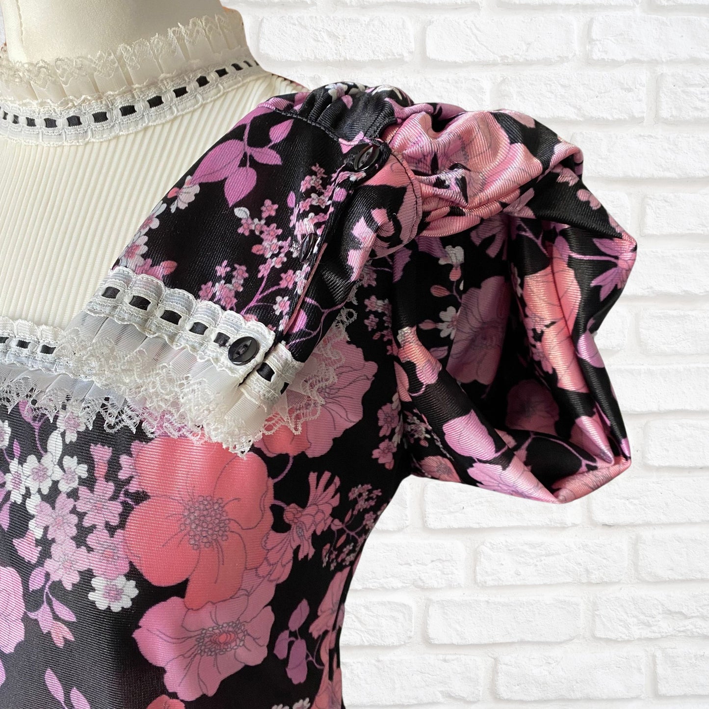 60s high necked long sleeved black and pink floral blouse  . Approx UK size 10-12