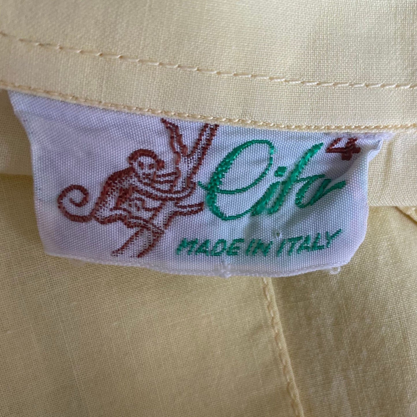 80s short sleeved yellow cotton shirt . Approx U.K. size 12-14
