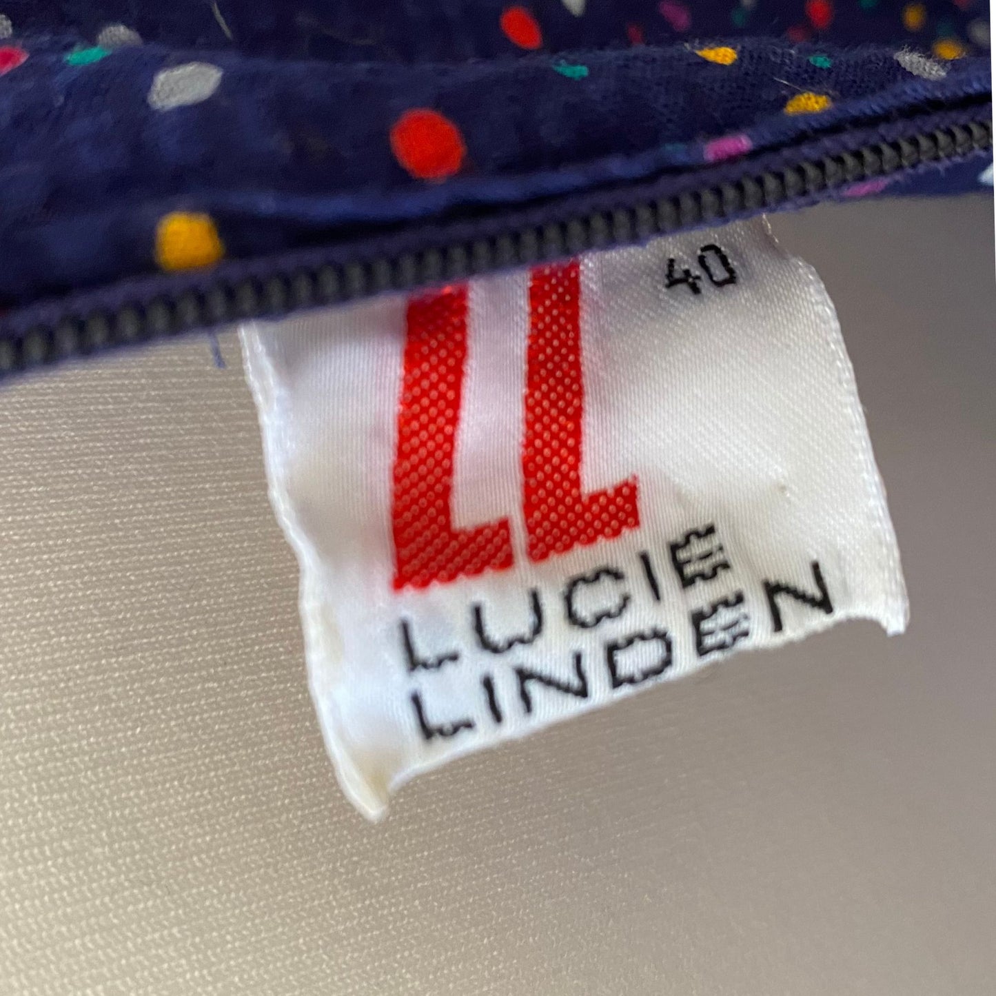 70s dark blue and rainbow polka dot sundress with red trim and belt. Approx UK size 10- 12