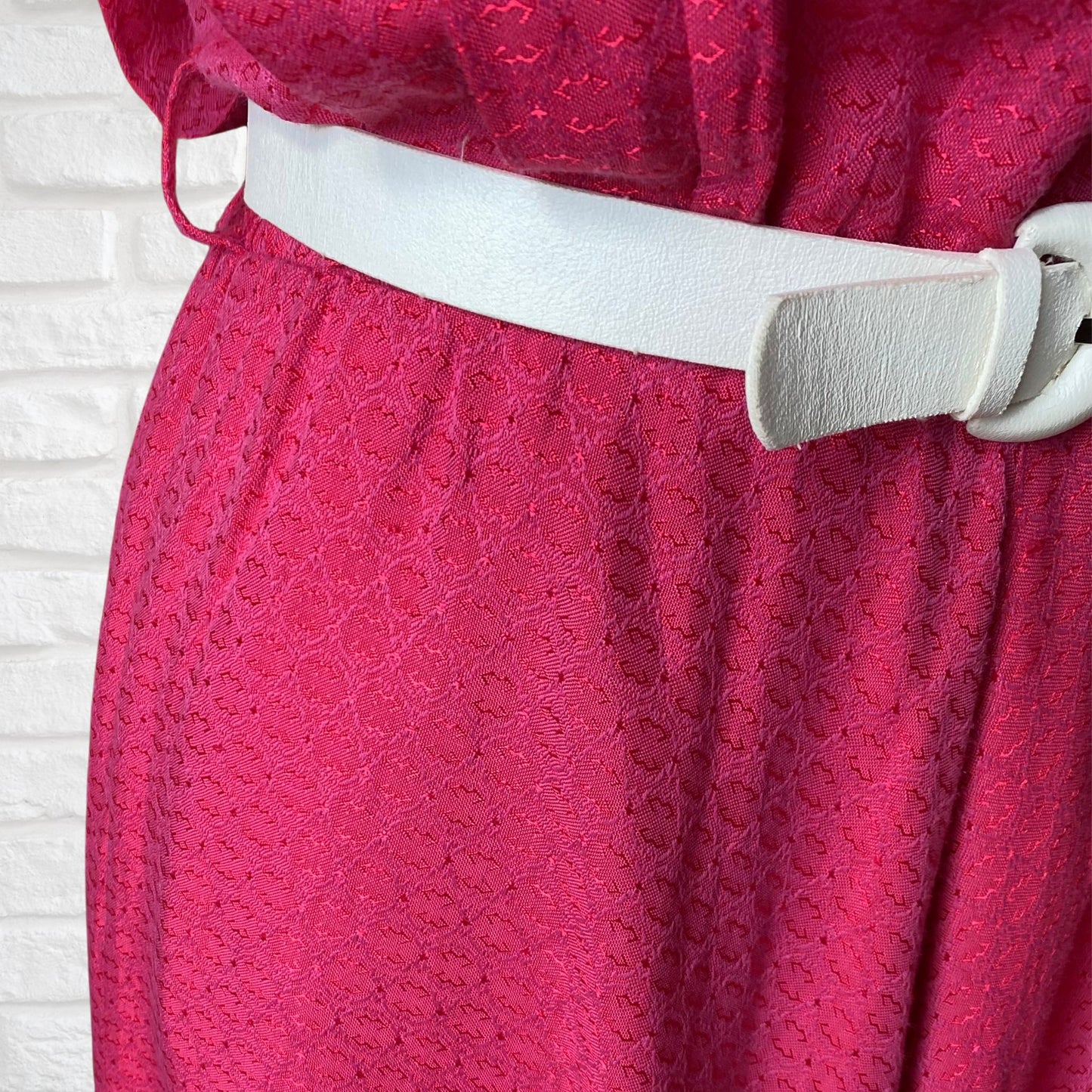 80s bright pink brocade dress with stiff white embroidery anglaise underskirt. Approx UK size 12-14