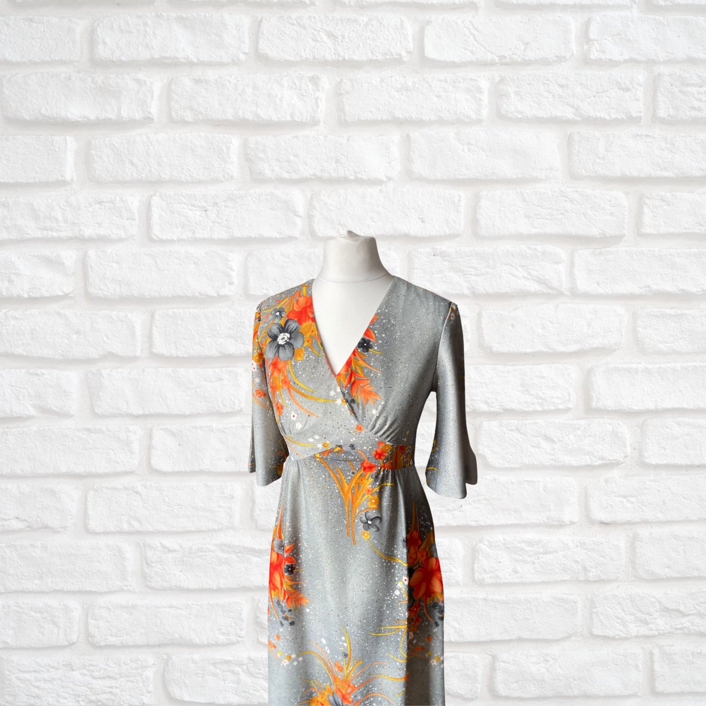 70s Hawaiian vintage maxi dress in an orange floral print.  Approx U.K. size 4-6