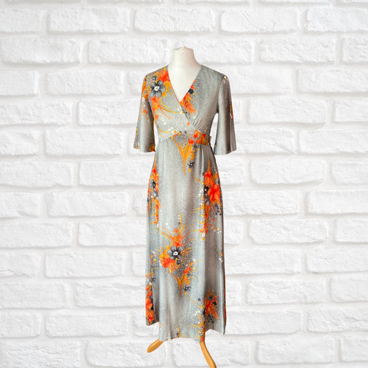 70s Hawaiian vintage maxi dress in an orange floral print.  Approx U.K. size 4-6