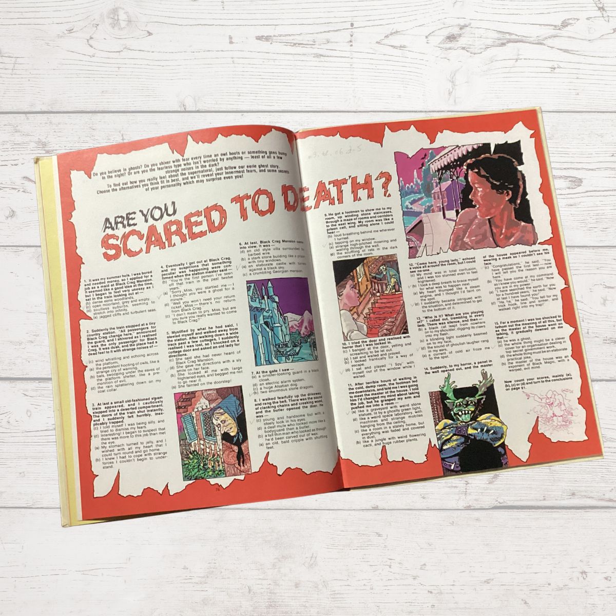 Open book with text and illustrations on a wooden surface