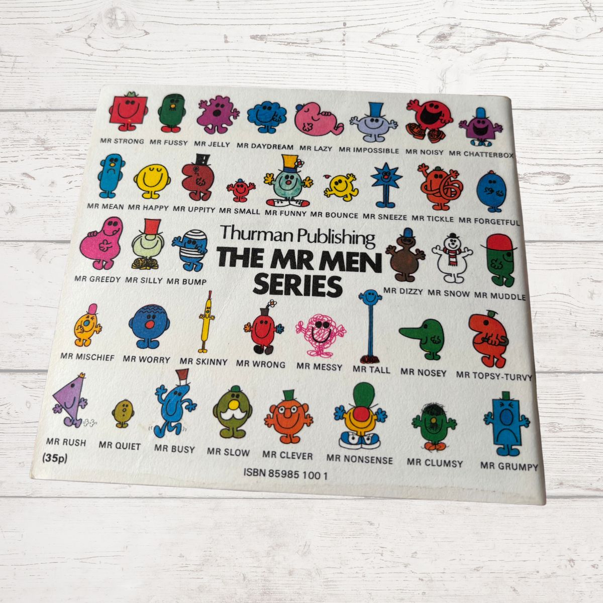 Book cover of 'The Mr Men Series' with colorful characters on a white background