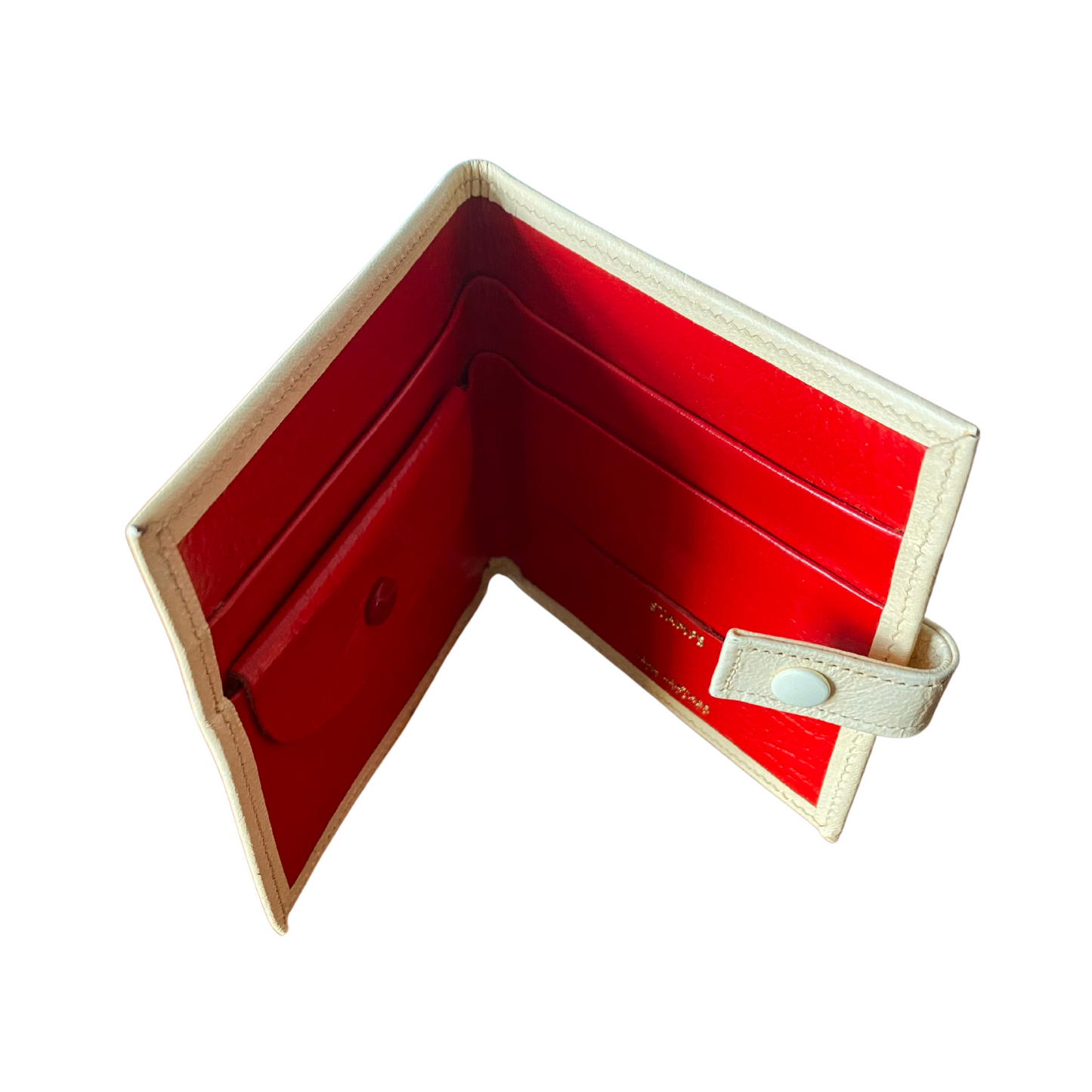 Red leather lined wallet with space for notes, cards and stamps