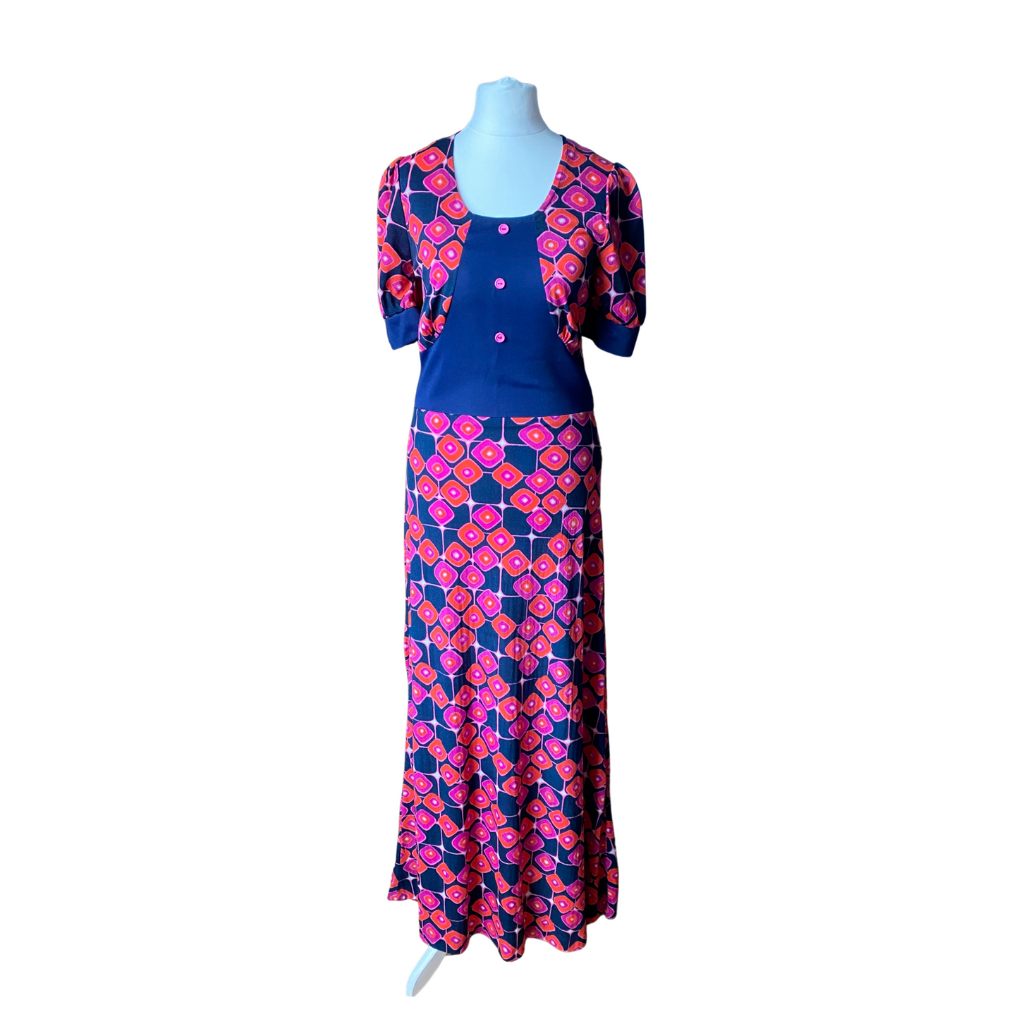 Full length 70s pink, purple blue and orange diamond print dress with shorty puffed sleeves
