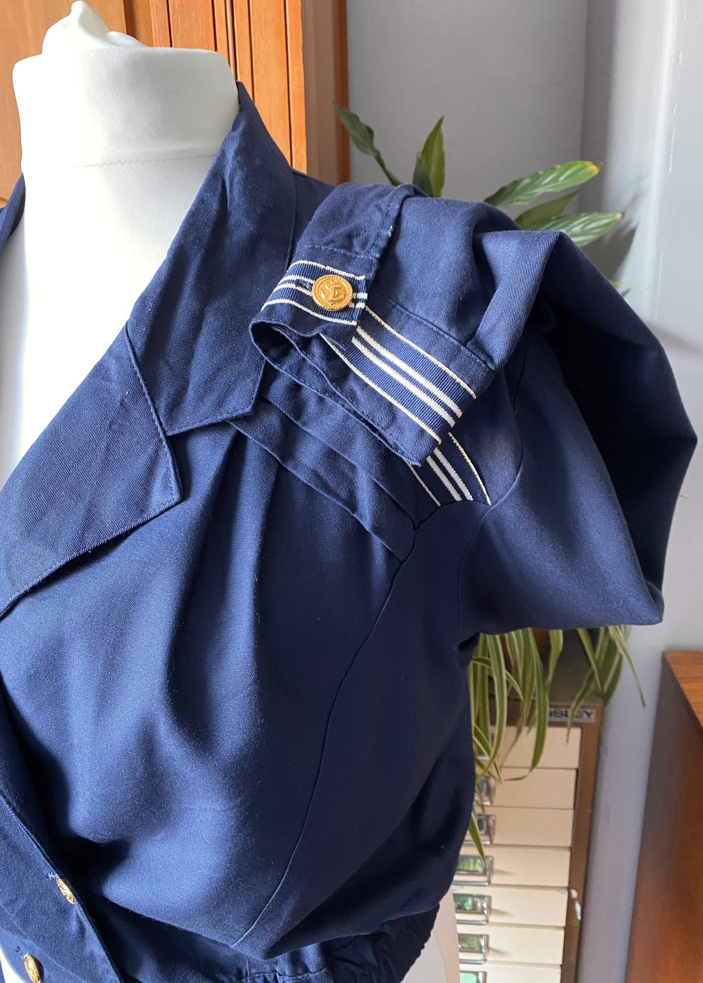 80s blue sailor style jacket with military style detailing. Approx UK size 16-18
