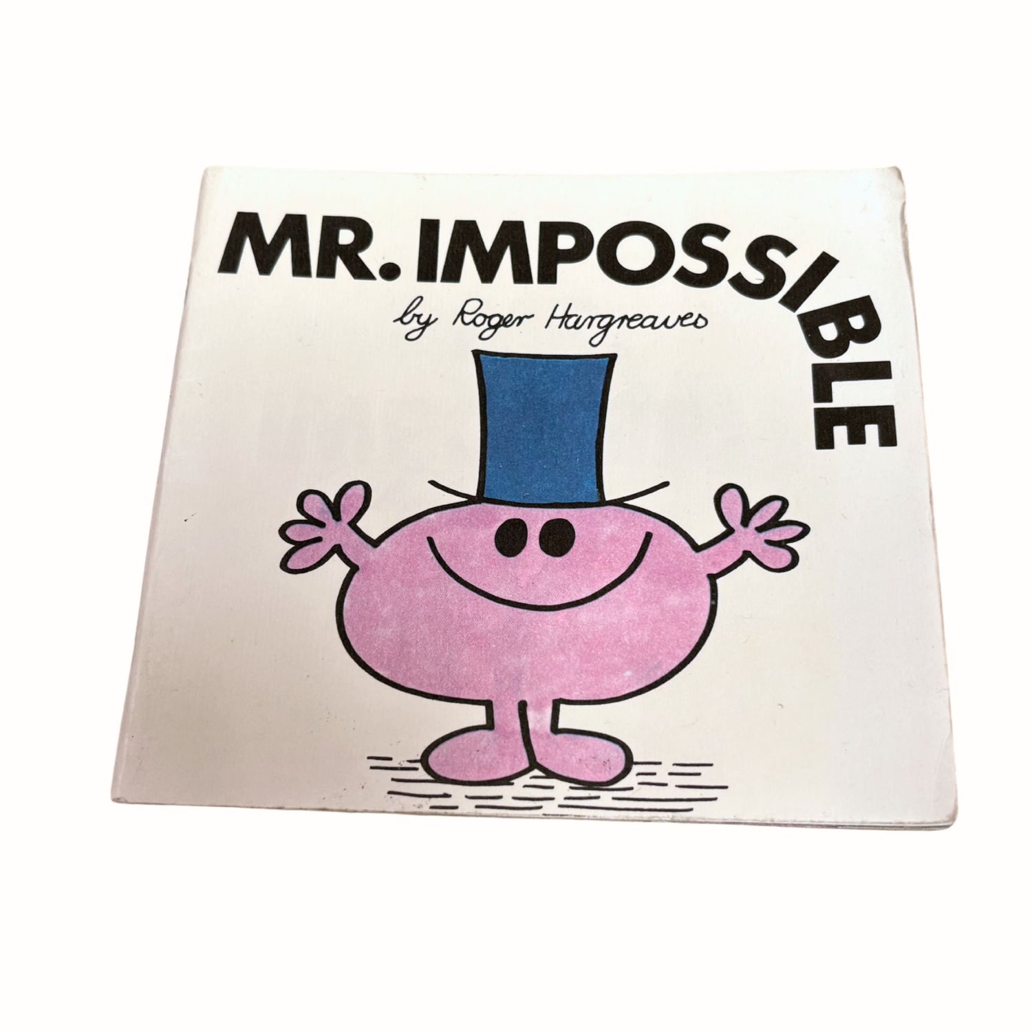 1970s small white book featuring Mr Impossible by Roger Hargreaves.