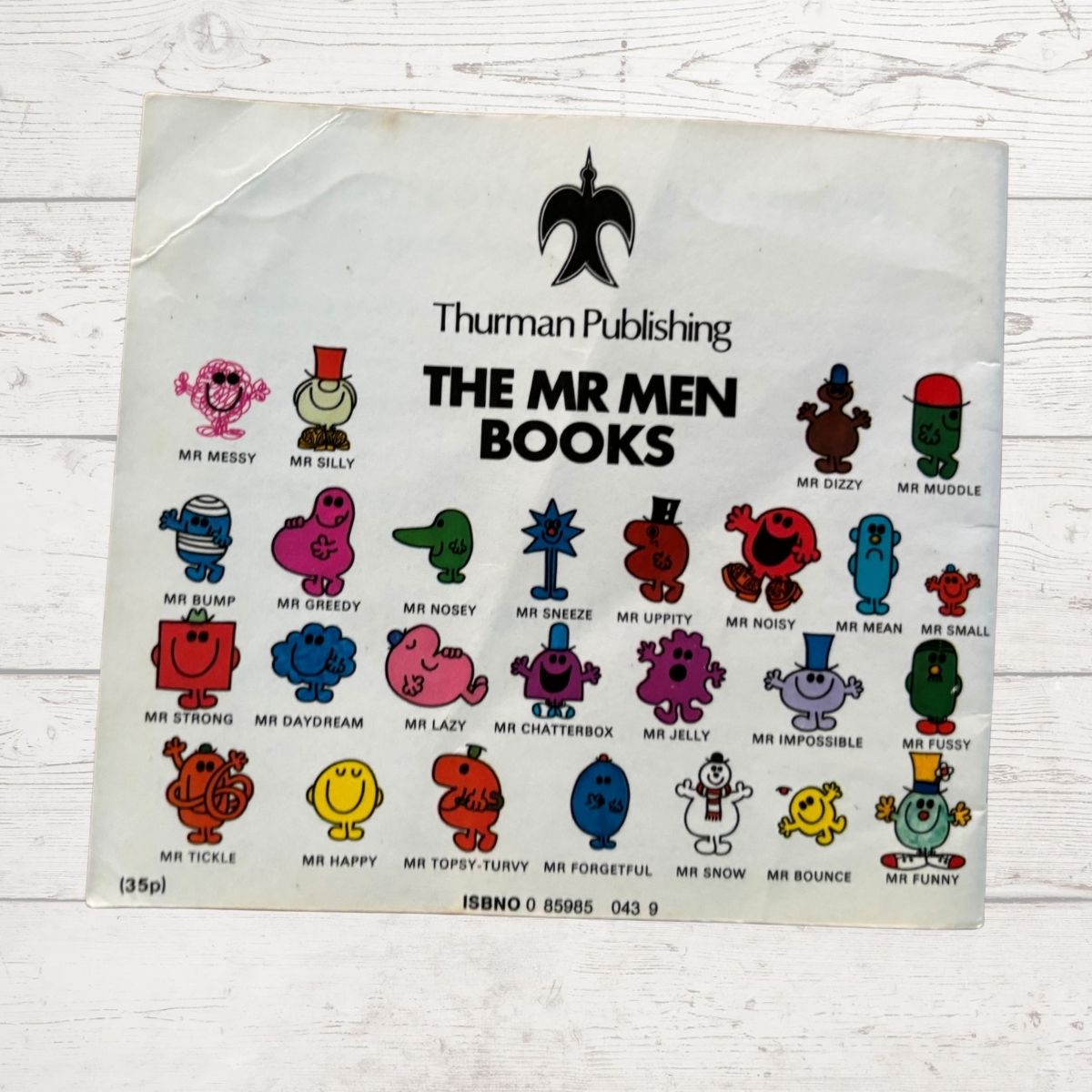 Back cover if Mr Lazy showing all the Mr Men 