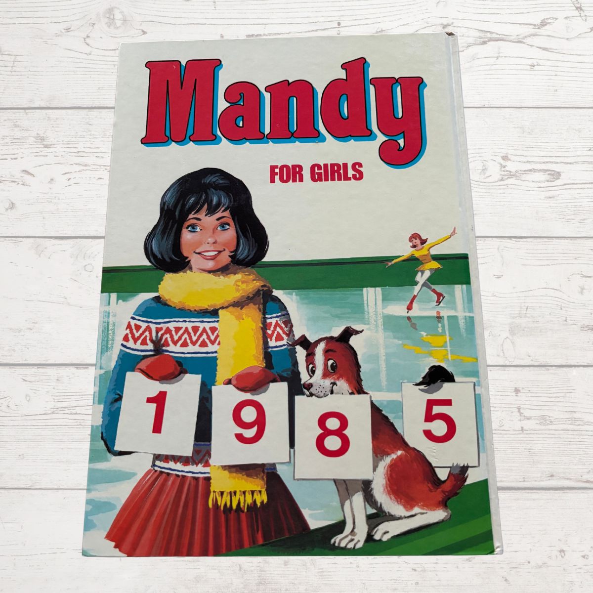 1985 vintage Mandy annual on a  white background 