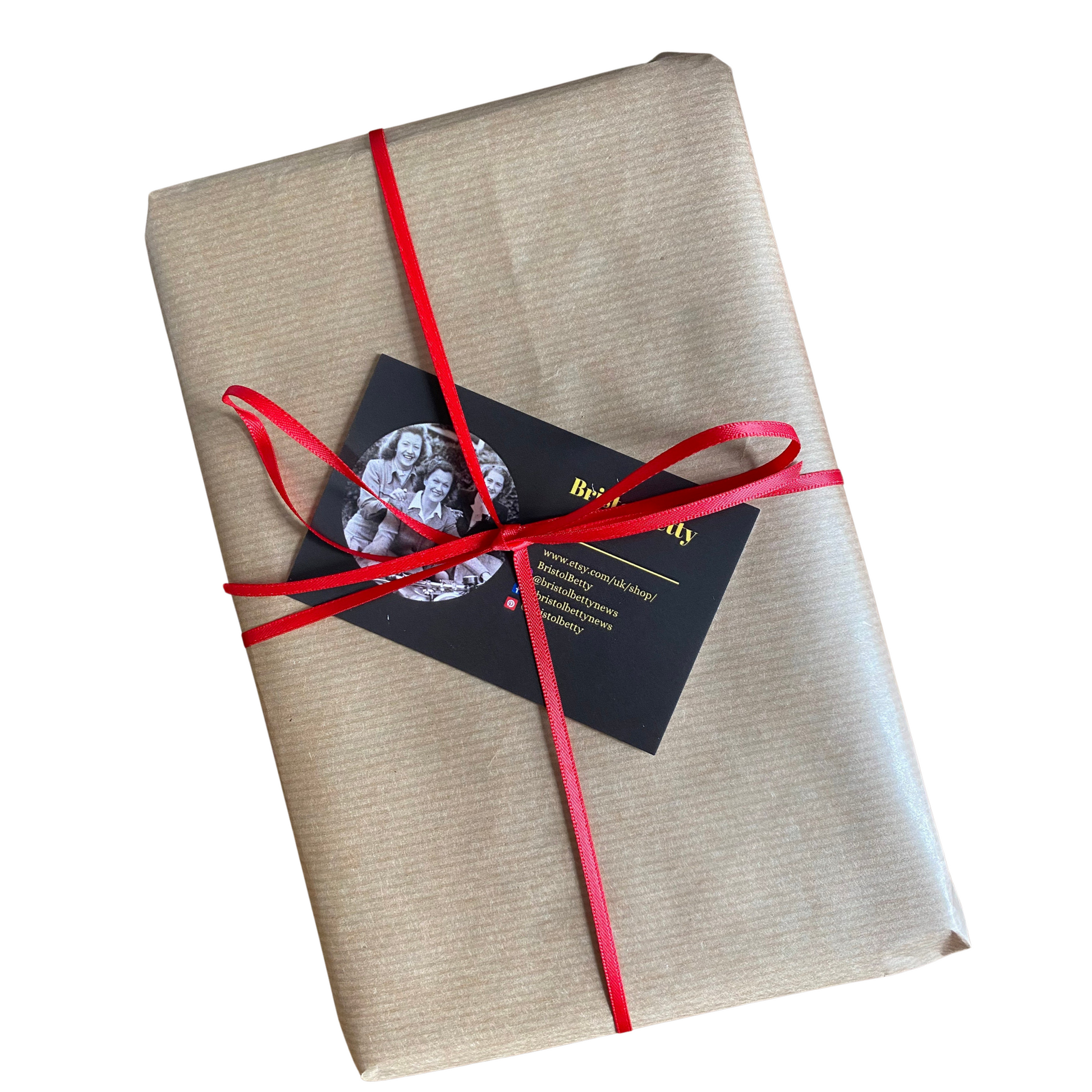 All books are wrapped in brown Kraft paper and ribbon 
