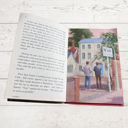 Open book showing a page with text and an illustration of two people standing outside a house with a 'To Let' sign.