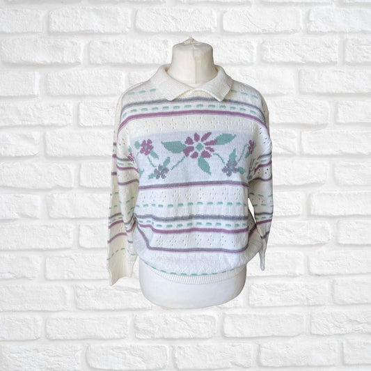 80s floral graphic sweater on a white background