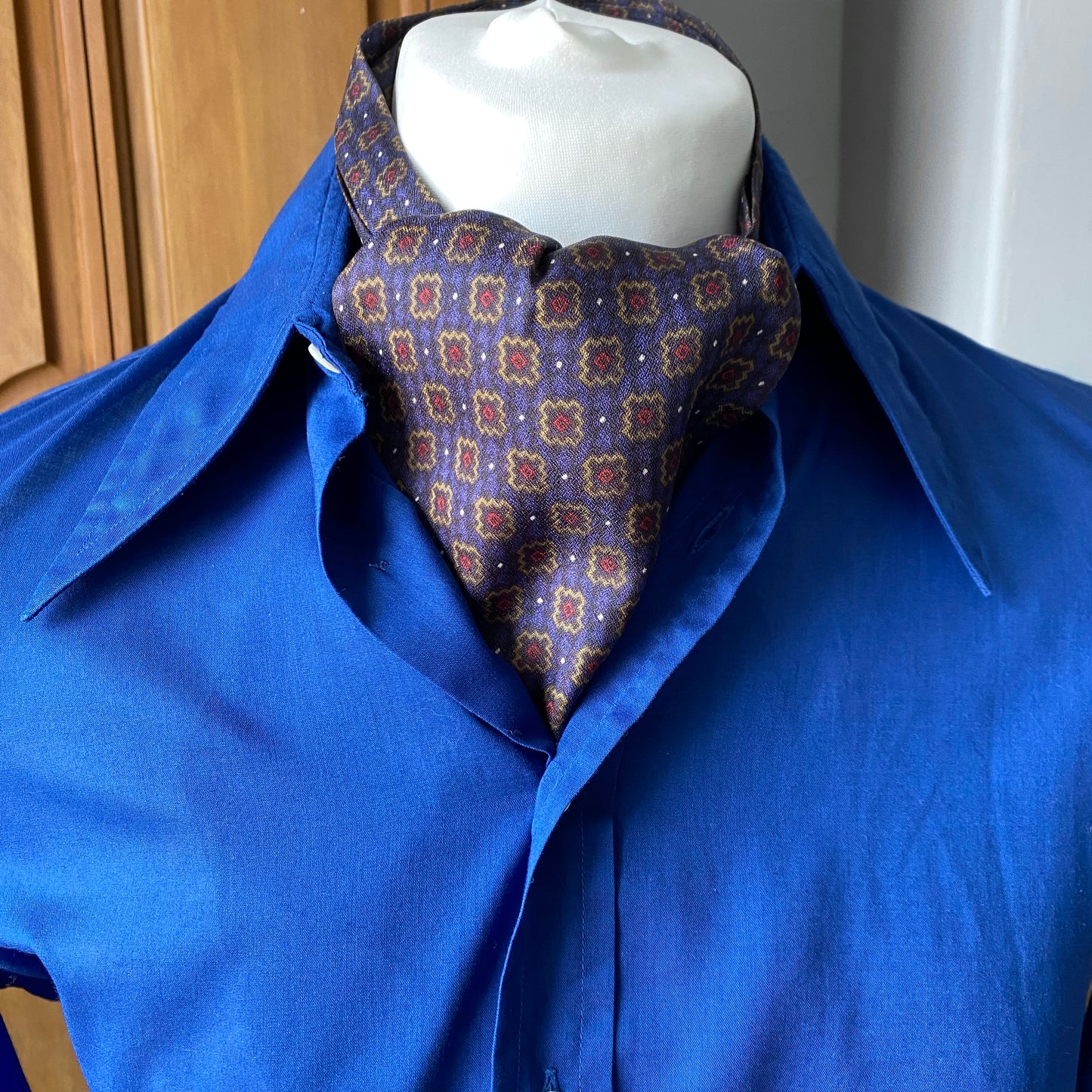 Mod style purple, gold, red and black tile print vintage cravat by British brand Duggie