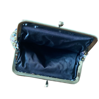Clip framed tapestry vintage bag with plastic lining for carrying make up or money 
