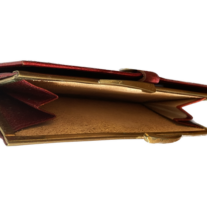 Classic red leather purse/wallet with a secure clasp and spacious interior