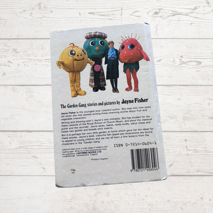 Back cover of Oliver onion and Tim Tomato garden gang book On a white background 
