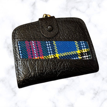 Black wallet with a plaid strap on a white background
