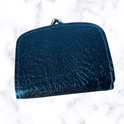 Black textured wallet on a white background