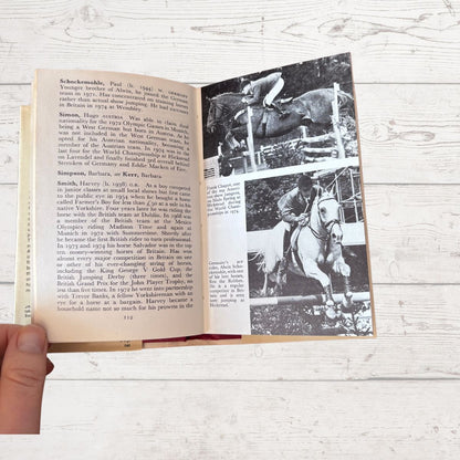 Open book with horse eventing photos 