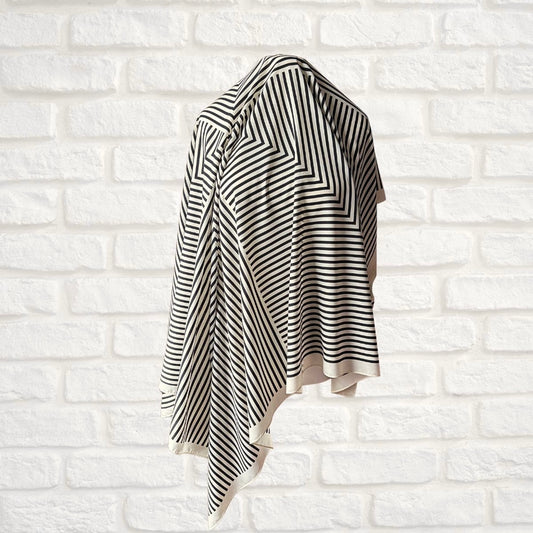 Cream and black striped large scarf on a white background 