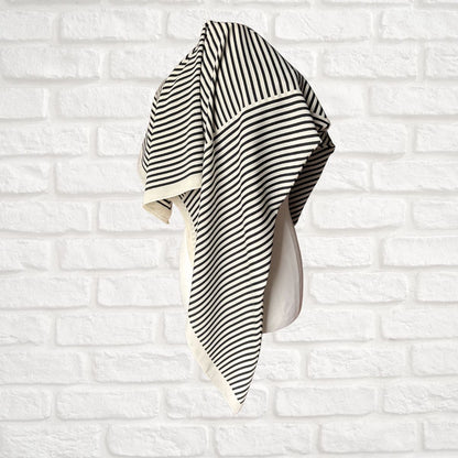 Cream and black striped vintage scarf On a  white background 
