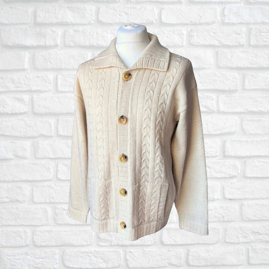 Cream unisex collared wool vintage cardigan on a white background 