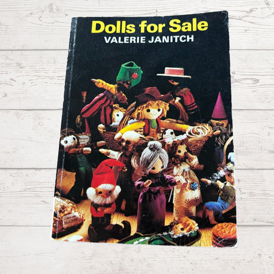 Book titled 'Dolls for Sale' by Valerie Janitch with illustrations of dolls on the cover.