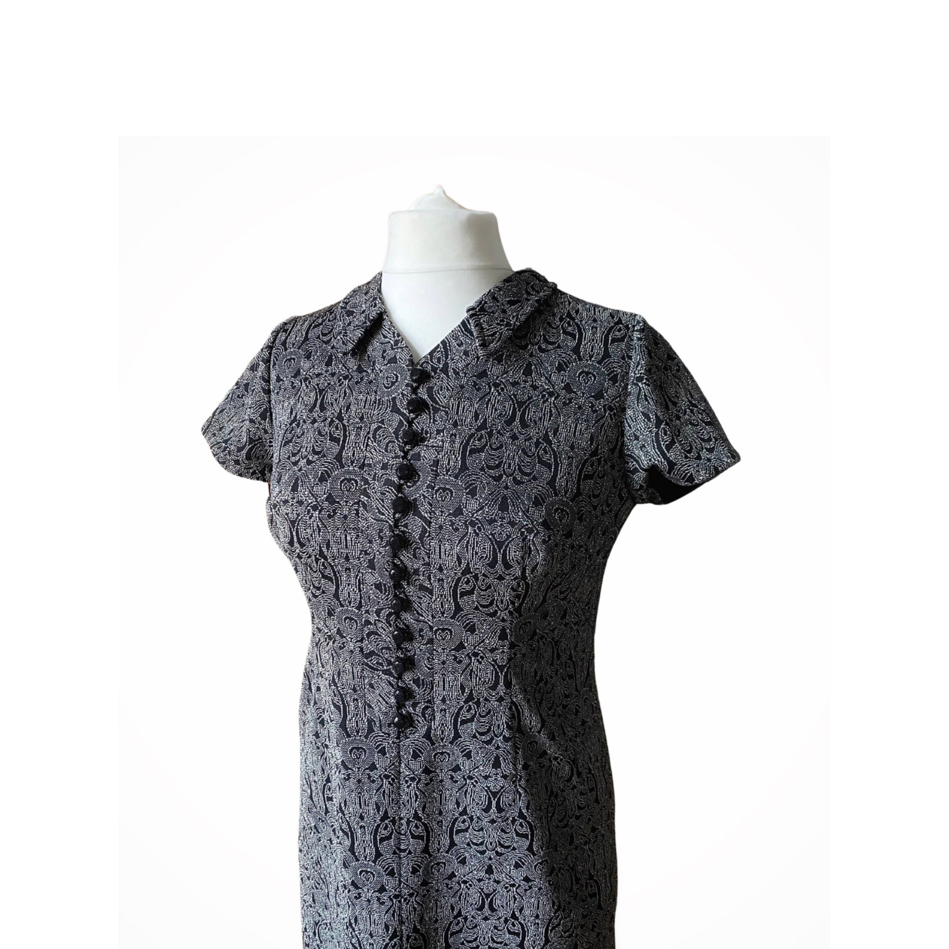 Vintage black button down Christmas party dress with silver art deco print