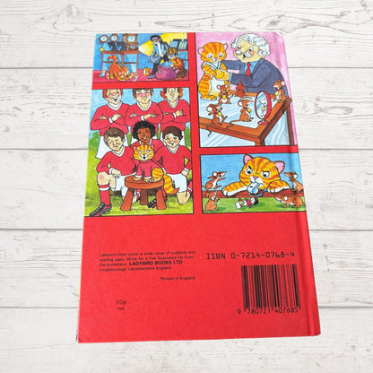Back cover of a children's book with colorful illustrations and a red background.