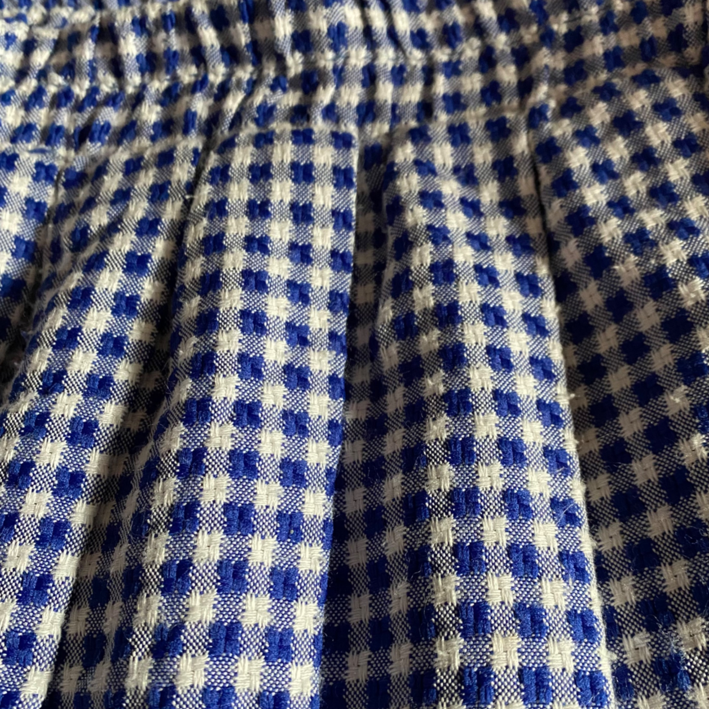 Chic and stylish textured gingham skirt - close up rayon/ polyester fabric view 