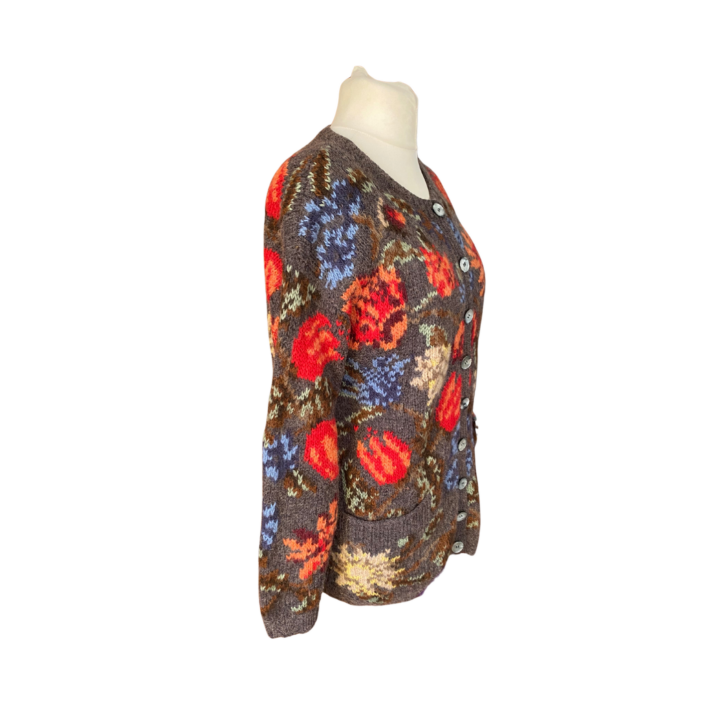 Stay warm and stylish in this chunky vintage-inspired cardigan featuring a colourful floral design - side view 