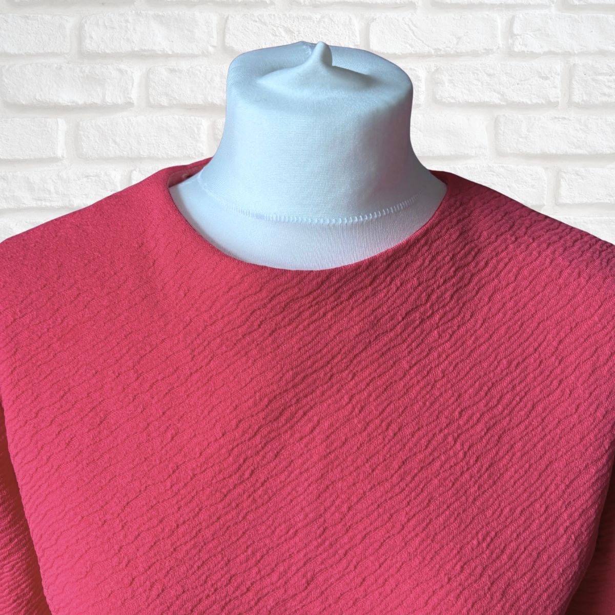Close up of round neckline 