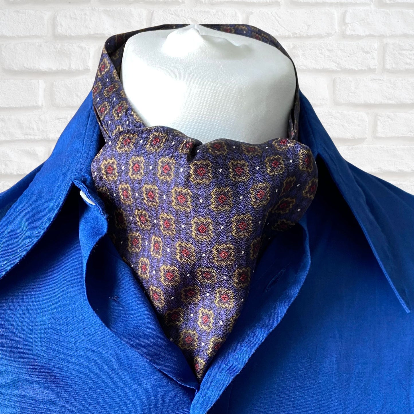 Mod style purple, gold, red and black tile print vintage cravat by British brand Duggie