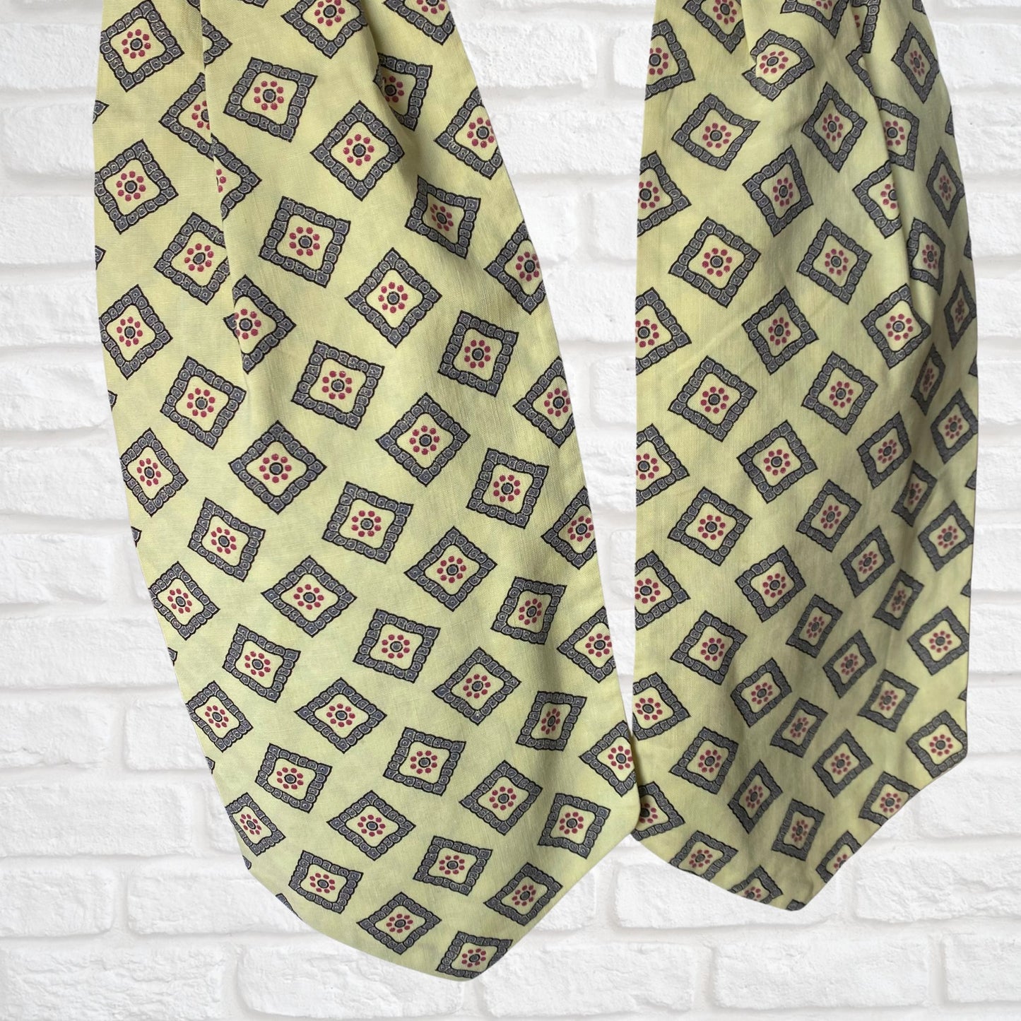 Mod style pale yellow, grey blue and red print vintage cravat by British brand Duggie