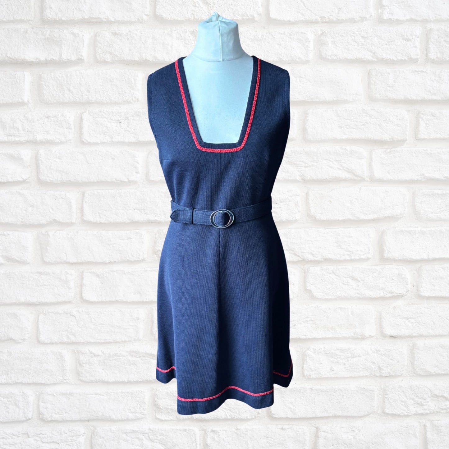 60s navy blue pinafore dress with red brocade trim and matching belt. Approx UK size 12-14