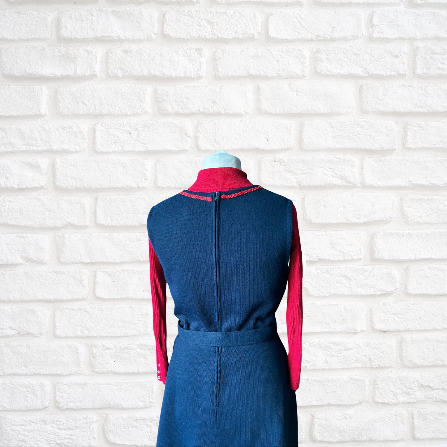 60s navy blue pinafore dress with red brocade trim and matching belt. Approx UK size 12-14