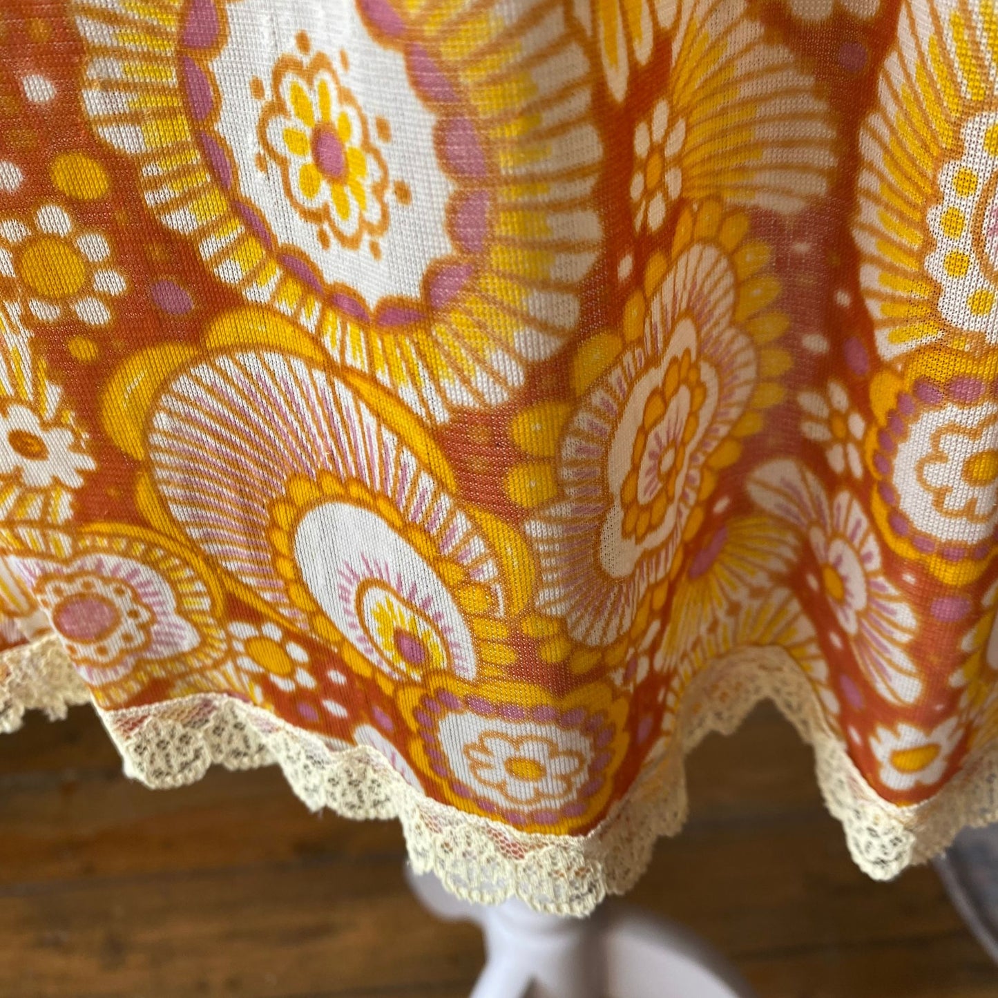 70s yellow and orange psychedelic print waist slip/ skirt. Approx U.K. size 14-20