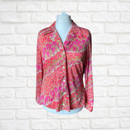 70s pink floral blouse with dagger collar and long cuffed sleeves.Approx UK size 14-16