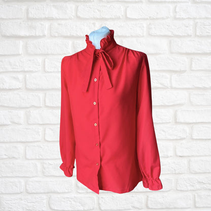 Red 80s secretary blouse with high frill collar and tie neck. Approx UK size 10-12